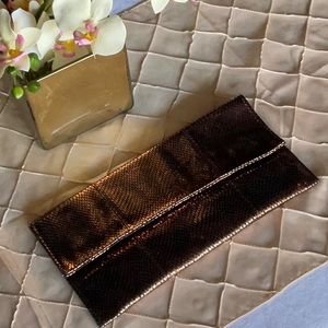Faux snakeskin clutch